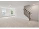 Spacious basement with neutral carpeting and stairs at 2802 Lacy St, North Charleston, SC 29406