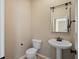 Bathroom with pedestal sink and toilet at 209 Grand Oaks Dr, Ladson, SC 29456