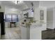 Modern kitchen with white cabinets, stainless steel appliances, and an island at 1828 Belle Chez, Mount Pleasant, SC 29464