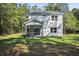 House with screened porch and grassy backyard at 3529 Johan Blvd, Johns Island, SC 29455