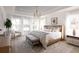 Spacious main bedroom with large windows and stylish decor at 424 Grove End Rd, Moncks Corner, SC 29461