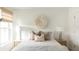 Serene bedroom featuring a light color scheme, soft textures, and a large Juju hat at 424 Grove End Rd, Moncks Corner, SC 29461