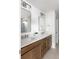 Bathroom with double vanity, hexagon tile floor, and modern lighting at 424 Grove End Rd, Moncks Corner, SC 29461