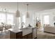 Modern kitchen with white cabinets, quartz countertops, and a farmhouse sink at 424 Grove End Rd, Moncks Corner, SC 29461