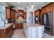 Well-appointed kitchen with granite countertops, custom cabinetry and island at 1531 Murphys Island Ct, Awendaw, SC 29429