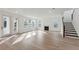 Spacious living room with hardwood floors, fireplace and access to backyard at 1679 Siloh Dr # 494, Mount Pleasant, SC 29466