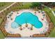 Relaxing community pool with surrounding lounge chairs at 1679 Siloh Dr # 494, Mount Pleasant, SC 29466