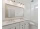 Bathroom with double vanity, white cabinets and a bathtub at 1679 Siloh Dr # 494, Mount Pleasant, SC 29466
