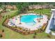 Inviting community pool area with shaded seating at 1679 Siloh Dr # 494, Mount Pleasant, SC 29466