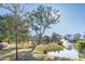 Scenic pond with fountain and lush landscaping at 1679 Siloh Dr # 494, Mount Pleasant, SC 29466