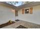 Inviting entryway with white brick and updated door at 1811 Walsingham Way, Charleston, SC 29412