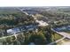 Aerial view of a property with surrounding businesses and trees at 3538 S Live Oak Dr, Moncks Corner, SC 29461