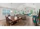 Open concept dining area adjacent to the living room at 437 Foxbank Plantation Blvd, Moncks Corner, SC 29461