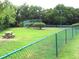 Community tennis court with picnic table nearby at 1481 Center Extension St # 208, Mount Pleasant, SC 29464