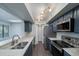 Updated kitchen featuring stainless steel appliances and blue cabinets at 1481 Center Extension St # 208, Mount Pleasant, SC 29464