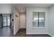 Bright entryway with dark laminate flooring and access to a balcony at 1481 Center Extension St # 208, Mount Pleasant, SC 29464