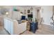 Bright living room featuring a white sofa, blue accents, and wood floors at 1640 Live Oak Park, Seabrook Island, SC 29455