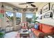 Relaxing sunroom with wicker furniture and coastal decor at 1640 Live Oak Park, Seabrook Island, SC 29455