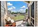Relaxing balcony with wicker furniture, offering scenic views at 1640 Live Oak Park, Seabrook Island, SC 29455