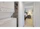Stackable washer and dryer in a convenient laundry closet at 1640 Live Oak Park, Seabrook Island, SC 29455