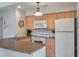 Well-equipped kitchen with light wood cabinets and modern appliances at 1640 Live Oak Park, Seabrook Island, SC 29455