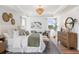 Luxurious main bedroom with a king-size bed and sitting area at 164 Middleton Dr, Goose Creek, SC 29445