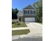 Two-story house with gray siding and a two-car garage at 3956 Treebranch Circle, Mount Pleasant, SC 29429