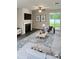 Spacious living room with fireplace and access to backyard at 3956 Treebranch Circle, Mount Pleasant, SC 29429