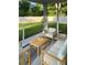 Peaceful screened porch with seating, ideal for outdoor relaxation at 3956 Treebranch Circle, Mount Pleasant, SC 29429