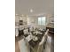 Elegant dining area with a large table and seating for eight at 3956 Treebranch Circle, Mount Pleasant, SC 29429