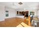 Spacious living room with hardwood floors, high ceilings, and fireplace at 7848 Pelican Bay Dr, Awendaw, SC 29429