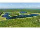 Aerial view of a large nature preserve with lakes at 7848 Pelican Bay Dr, Awendaw, SC 29429