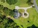 House with circular driveway and large yard at 7848 Pelican Bay Dr, Awendaw, SC 29429