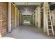 Unfinished garage with concrete floor at 7848 Pelican Bay Dr, Awendaw, SC 29429