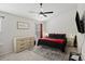 Spacious main bedroom with king-size bed, ceiling fan, dresser and lots of natural light at 175 Rosefield Ct, Summerville, SC 29485