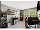 Bright home office with a large window, desk, and plenty of shelving for storage at 175 Rosefield Ct, Summerville, SC 29485