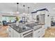 Spacious kitchen with large island, gas cooktop, and stainless steel appliances at 205 Whitesville Rd, Moncks Corner, SC 29461