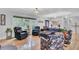 Bright living room with hardwood floors, comfortable seating, and natural light at 205 Whitesville Rd, Moncks Corner, SC 29461