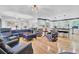 Open living room with hardwood floors and kitchen views at 205 Whitesville Rd, Moncks Corner, SC 29461