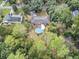 An aerial view of a house with a large backyard, a pool, and a garden at 205 Whitesville Rd, Moncks Corner, SC 29461