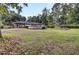 Brick home with above ground pool in large backyard at 205 Whitesville Rd, Moncks Corner, SC 29461