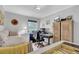 Bedroom with daybed, workspace, and built-in closet at 205 Whitesville Rd, Moncks Corner, SC 29461