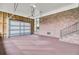 Spacious garage with exposed brick, new door and flooring at 205 Whitesville Rd, Moncks Corner, SC 29461