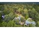 Aerial view of house and neighborhood, showing wooded area at 205 Whitesville Rd, Moncks Corner, SC 29461