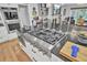 Large kitchen island with professional gas cooktop and granite countertop at 205 Whitesville Rd, Moncks Corner, SC 29461