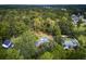 Aerial view of house and neighborhood, showing wooded area at 205 Whitesville Rd, Moncks Corner, SC 29461