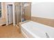 Bathroom boasts a soaking tub and a separate shower stall at 208 Sweetspire Ln, Summerville, SC 29483