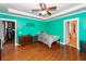 Serene bedroom with hardwood floors, ceiling fan and plenty of closet space at 208 Sweetspire Ln, Summerville, SC 29483