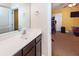 Bathroom with single vanity and view of a bedroom at 208 Sweetspire Ln, Summerville, SC 29483