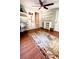 Home office with built-in shelving and hardwood floors at 106 Hardee Ave, Summerville, SC 29485
